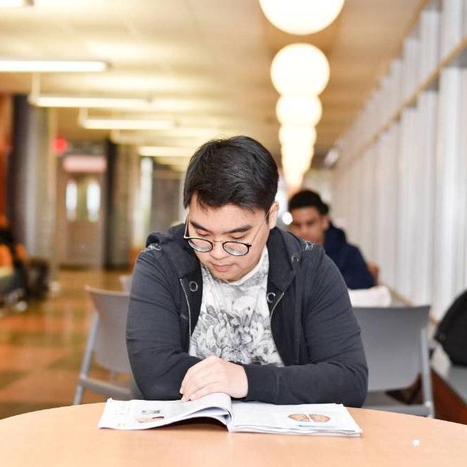 student studying at table